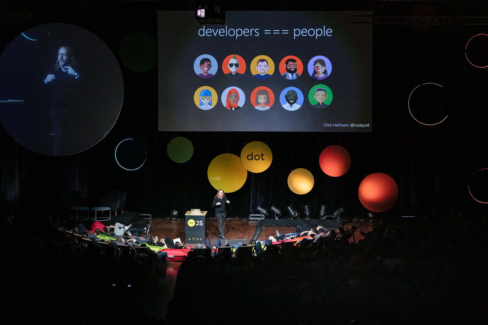 Chris Heilmann presenting at dotjs 2019 with a slide saying developers are people