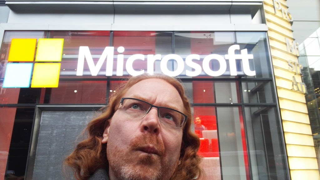 chris heilmann in front of the Microsoft Logo of the NYC office